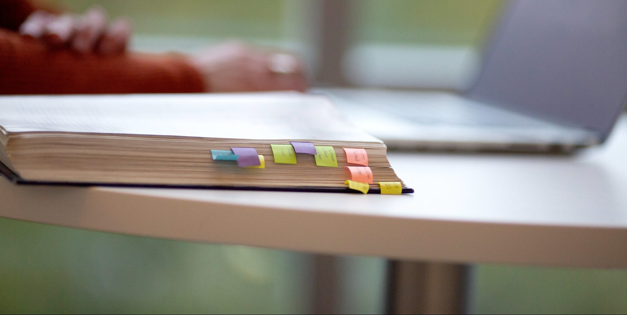 textook with postits