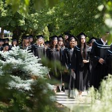 Grads walking on campus