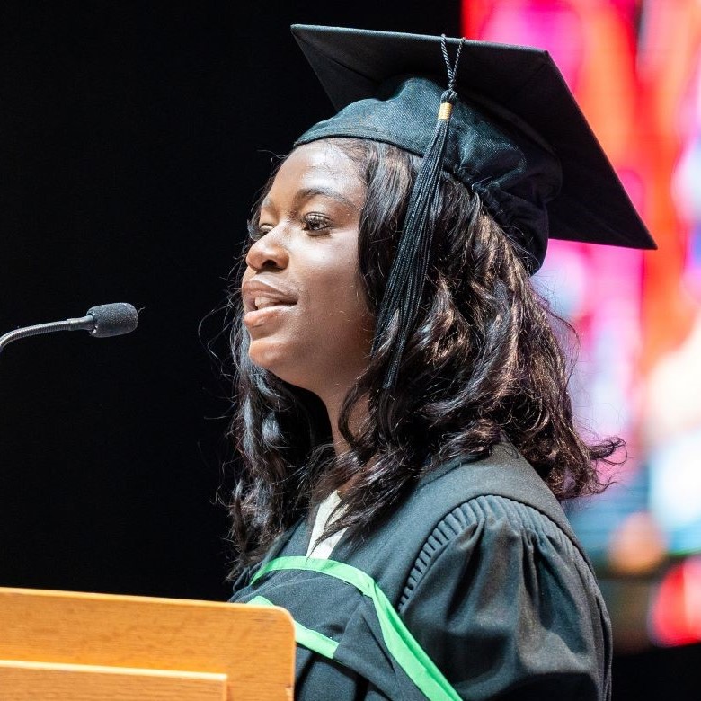 Graduate Oluwaseun Akinloye speaking at the 2024 convocation ceremony.